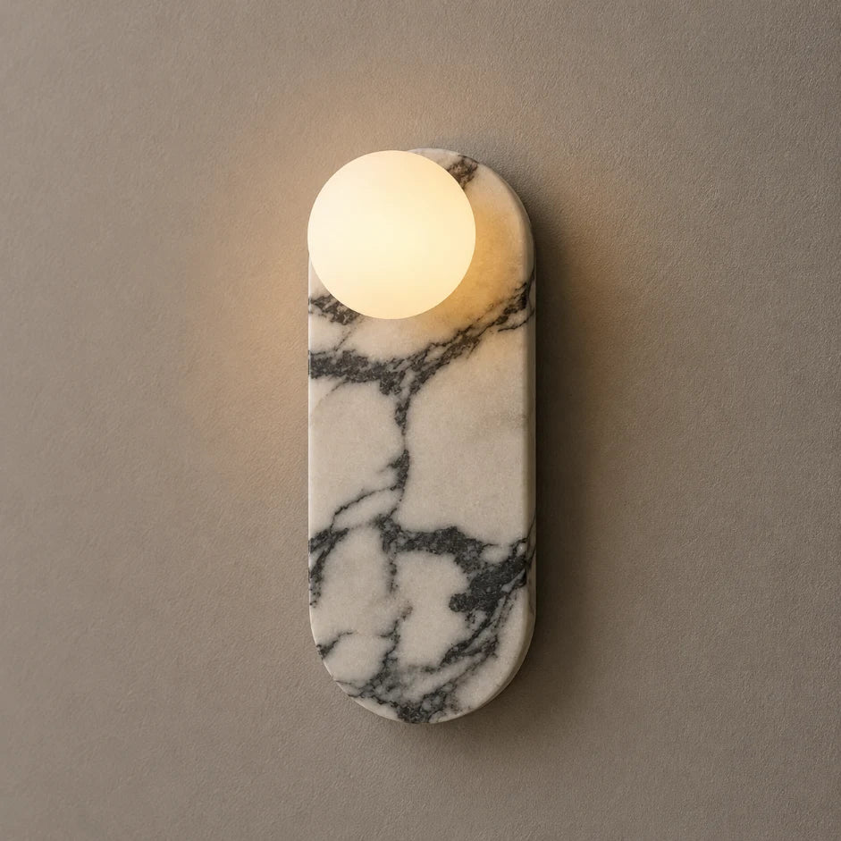 The Marmo Calacatta Viola marble wall sconce with violet veining