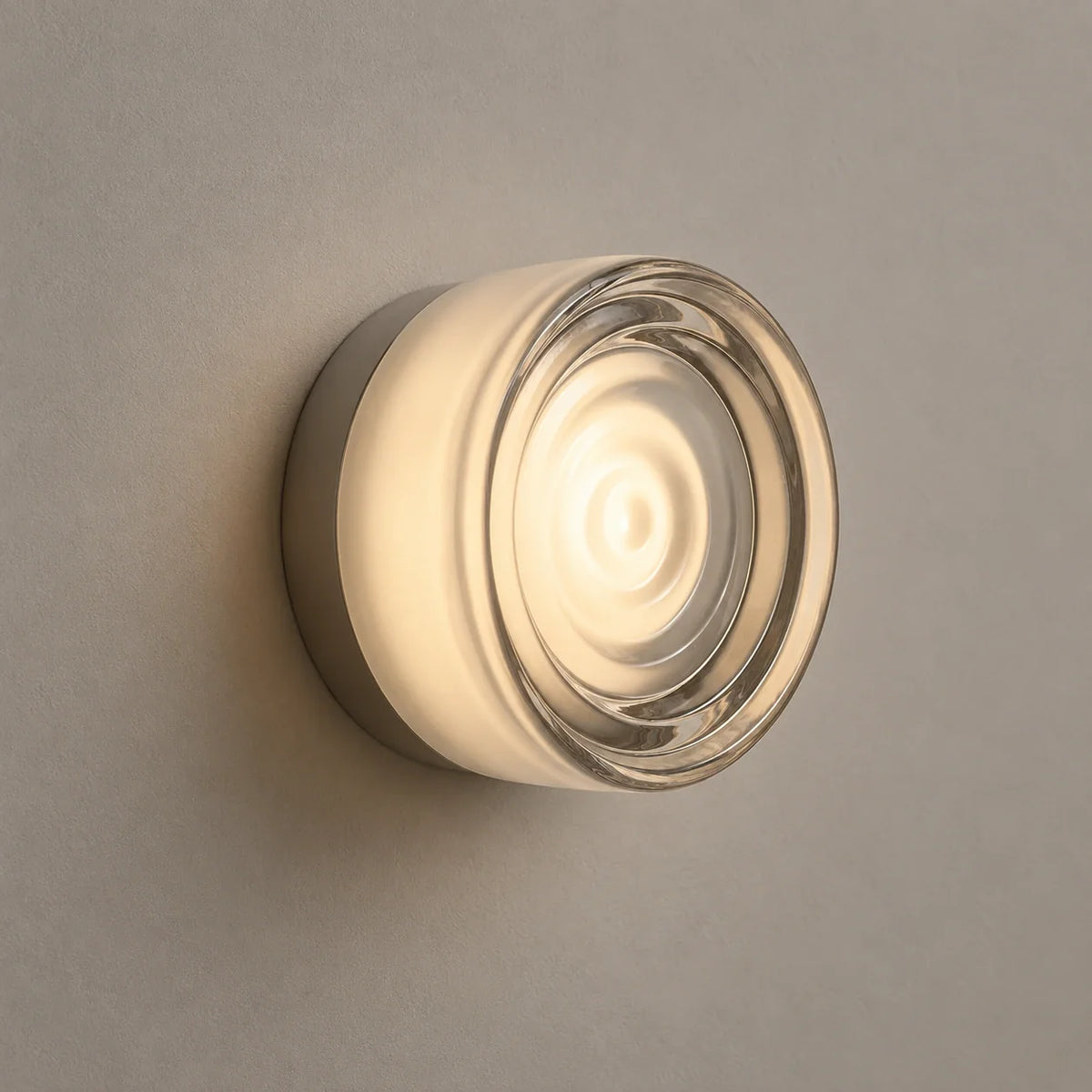 Outdoor wall sconce mounted beside a front door