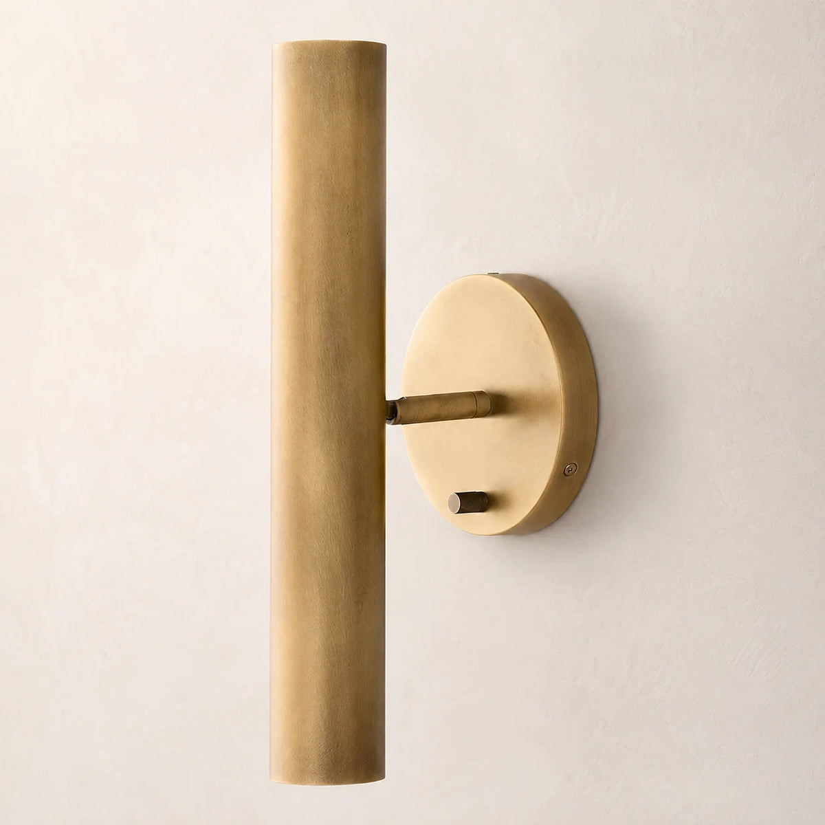 The Aurum brass and copper tube wall sconce by Battii