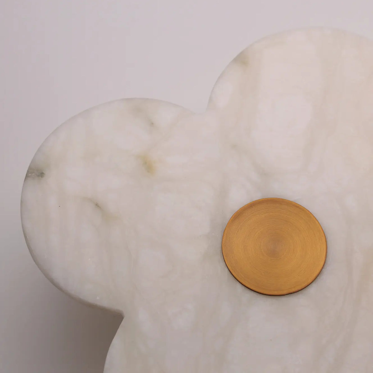 Alabaster stone veining detail on The Petalo wall sconce