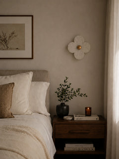 The Petalo alabaster clover wall sconce styled in bedroom