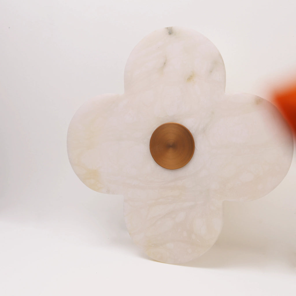 The Petalo alabaster wall sconce side view