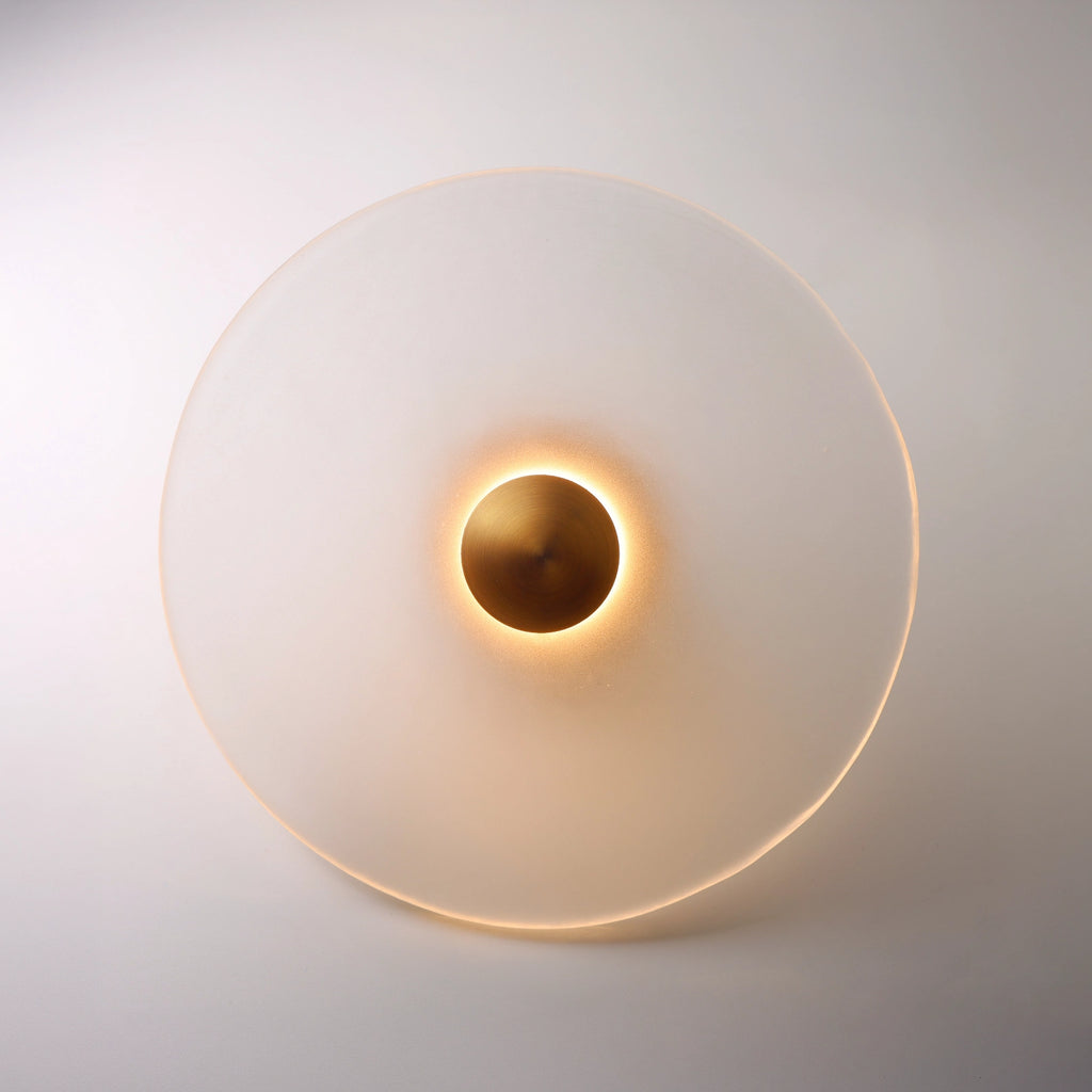 The Orbis wall sconce in antique copper finish