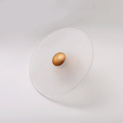 The Orbis wall sconce in brass finish, unlit