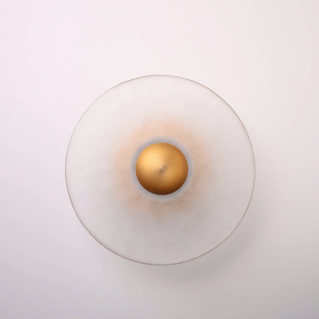 The Orbis brass wall sconce angle view