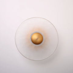The Orbis brass wall sconce angle view