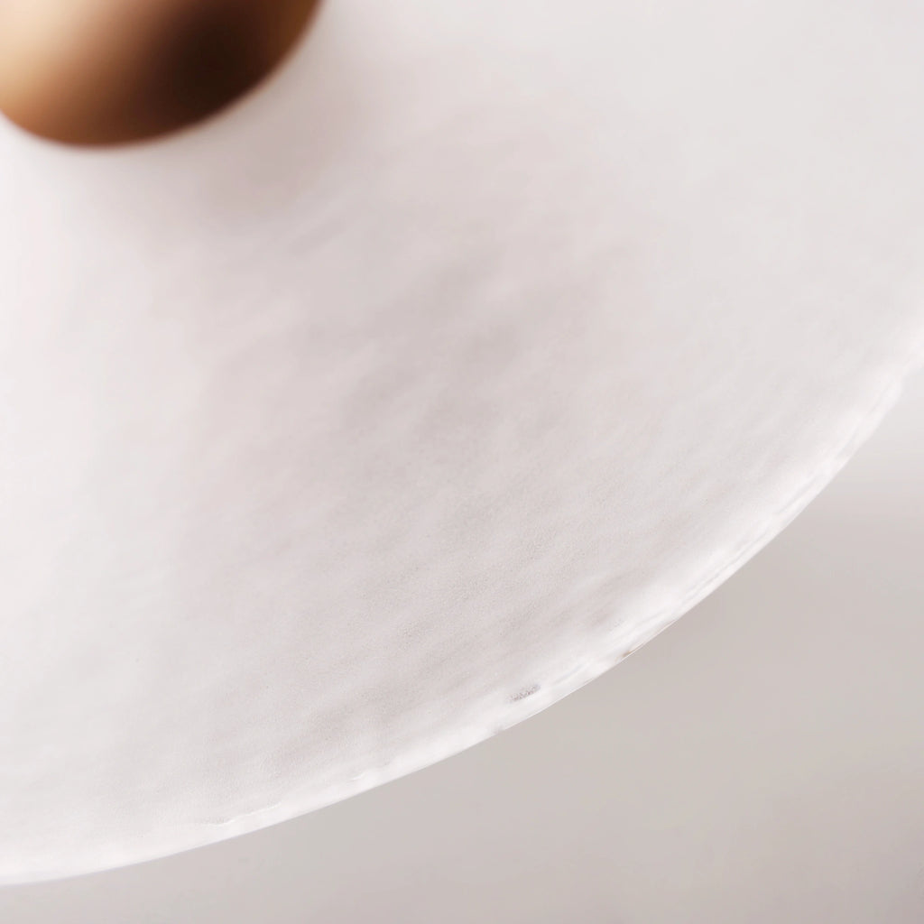Close-up of frosted glass texture on The Orbis wall sconce