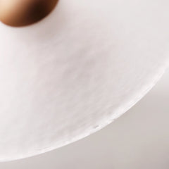 Close-up of frosted glass texture on The Orbis wall sconce