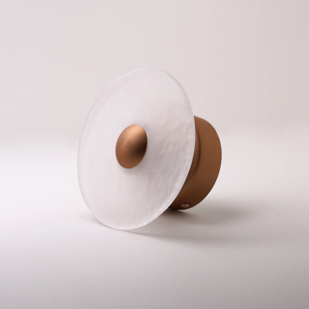 The Orbis frosted glass wall sconce with copper dome