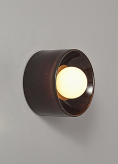 The Volta ceramic wall sconce in dark brown finish