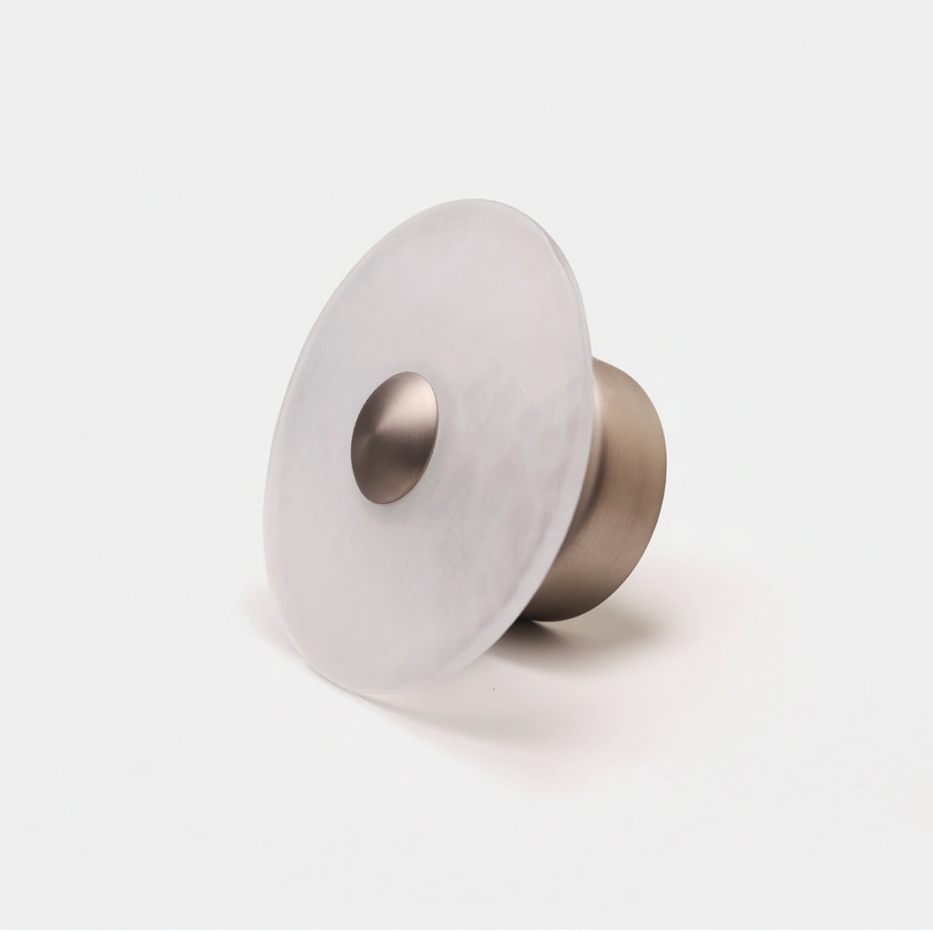 The Orbis frosted glass wall sconce with nickel dome