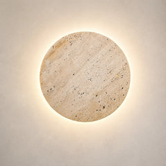 The Terra natural stone round wall sconce, front view
