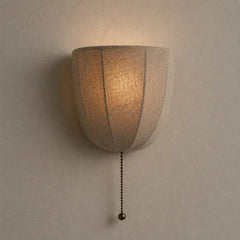 The Veil linen fabric wall sconce with pull chain, front view