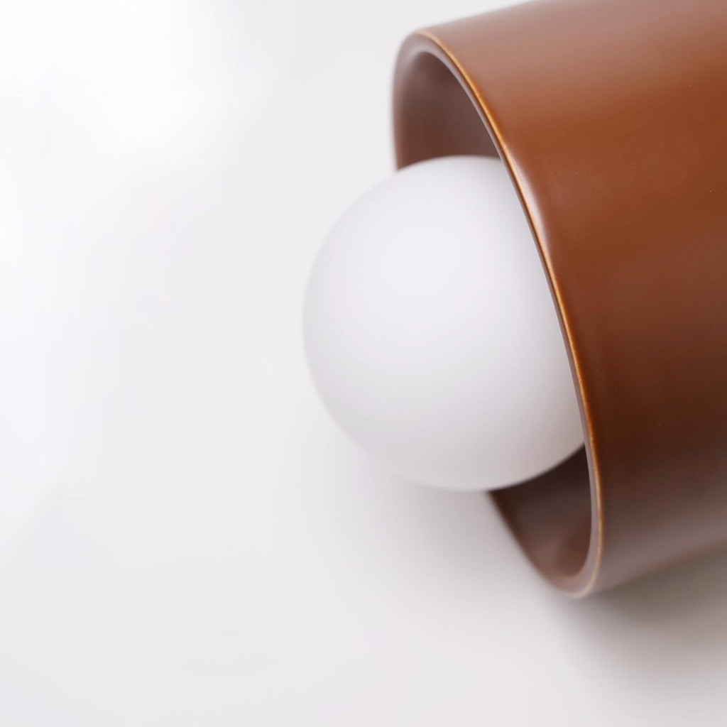 The Volta ceramic wall sconce in interior setting