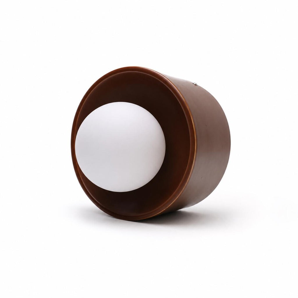 The Volta ceramic cylinder wall sconce front view